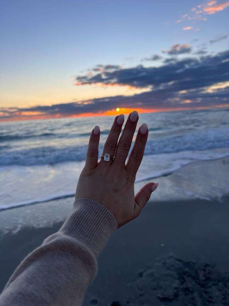 Diamond Ring on Hand at Beach